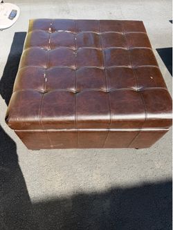 Brown leather like storage ottoman