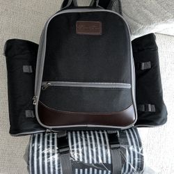 USED ONCE! Picnic backpack set. used 1 blanket, 3 plates and 2 cups once, the rest practically new!