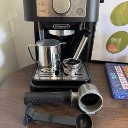 DeLonghi espresso machine w/ froth cup included $30