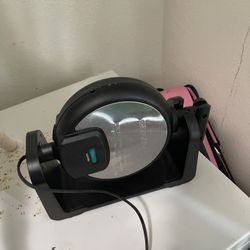 This is a Farberware Single-Flip Waffle Maker. 