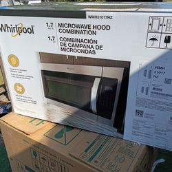 Brand new never opened whirlpool microwave oven hood combo