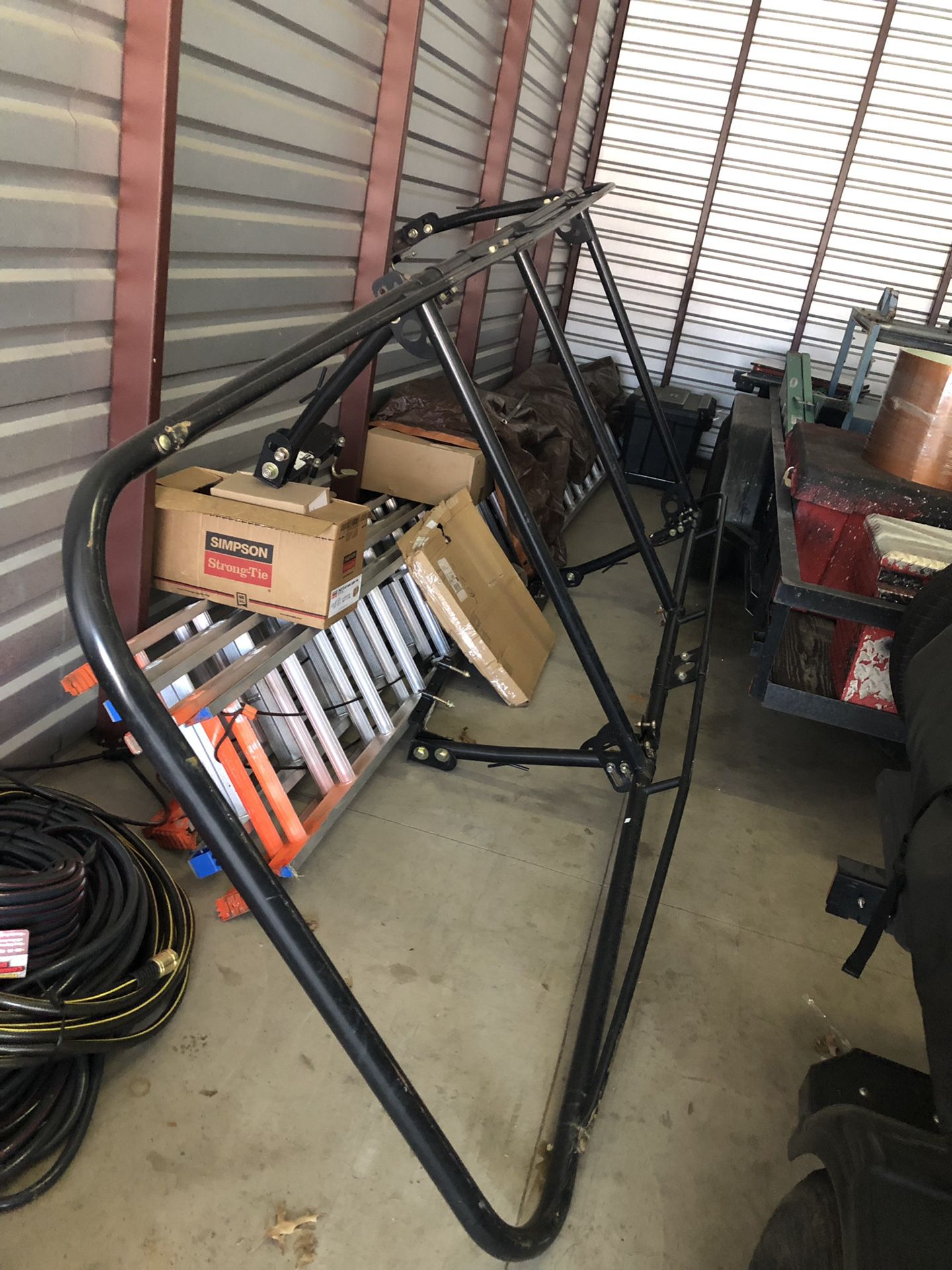 Adjustable ladder/plumber truck rack