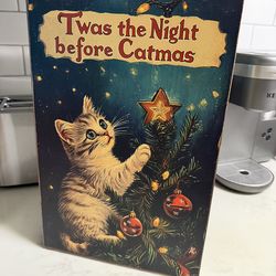 Giant Cat Scracher opens up as a book