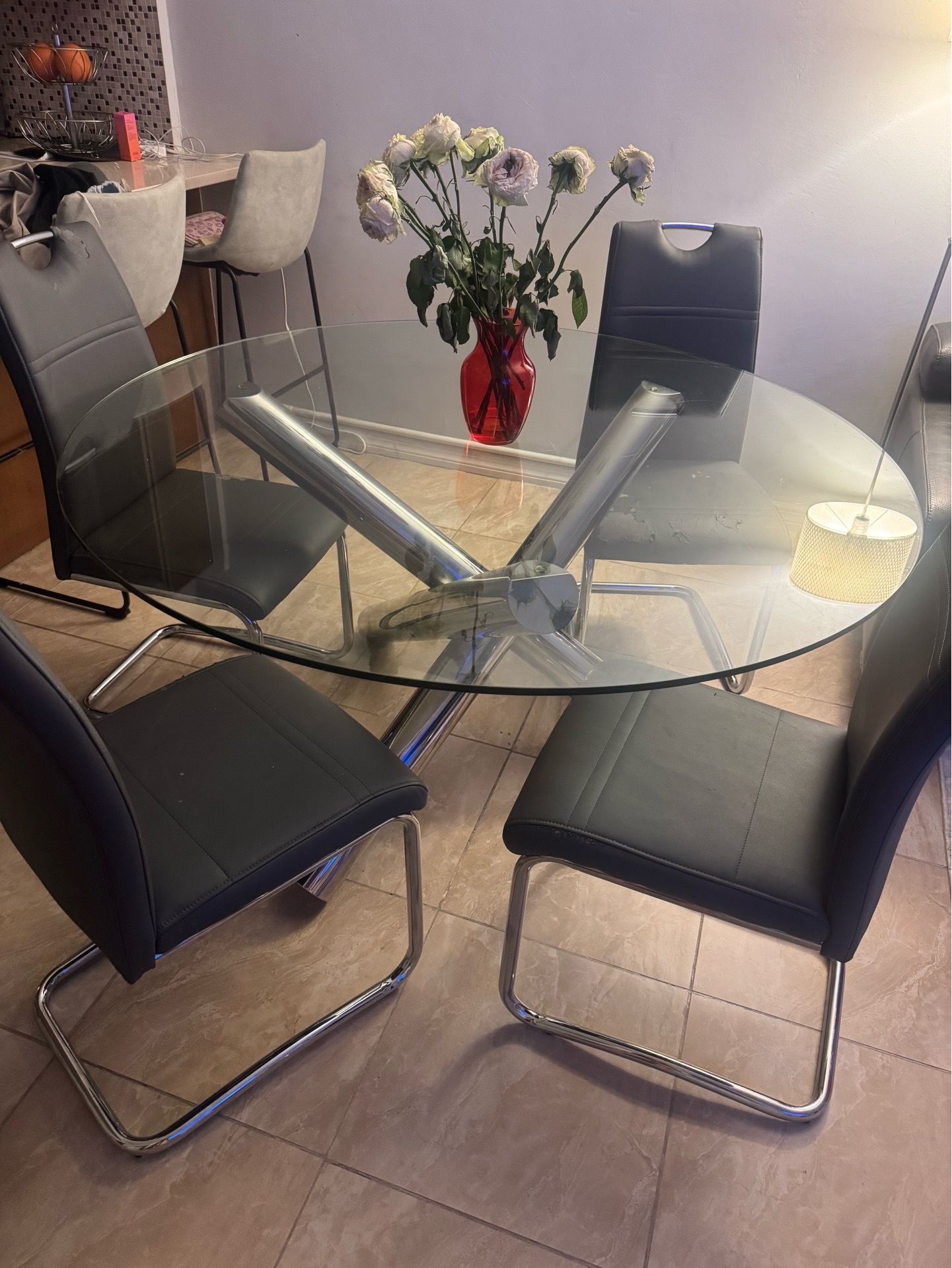 Glass table with 4 chairs