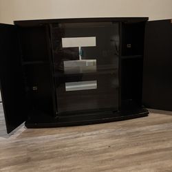 Tv Stand Has Two Side Storage Bins With One Shelf And Each Compartment, It Has A Large Center Storage Compartment For Dvd Player,  Gaming That Has To
