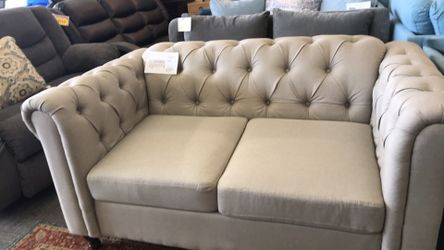 Tufted love seat