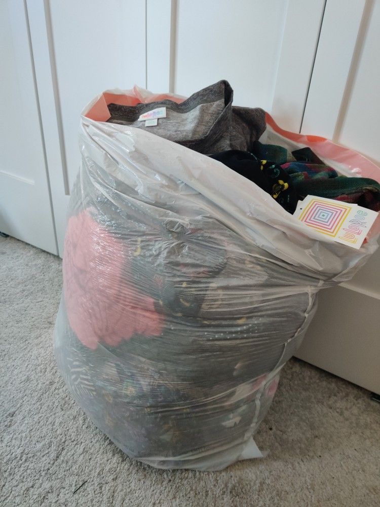 Large Kitchen bag full of Lularoe Shirts, Dress, And Cardigans