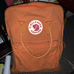 Orange full size fjallraven kanken backpack