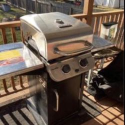 CHAR-BROIL 2 Burner Gas Grill. Starts Every Time. Well Taken Care Of. Has a Nice Cover-NO TANK