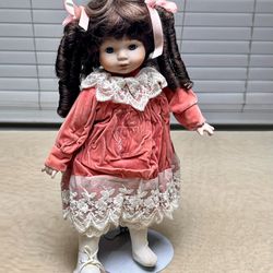 Vintage Porcelain Doll Dark Brown Hair, Blue Eyes Pink Dress, 