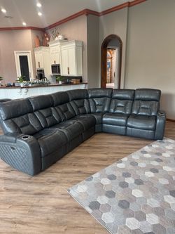 Gray Leather Reclining Sectional Sofa