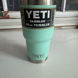 It is new Teal 30 ounce Tumbler