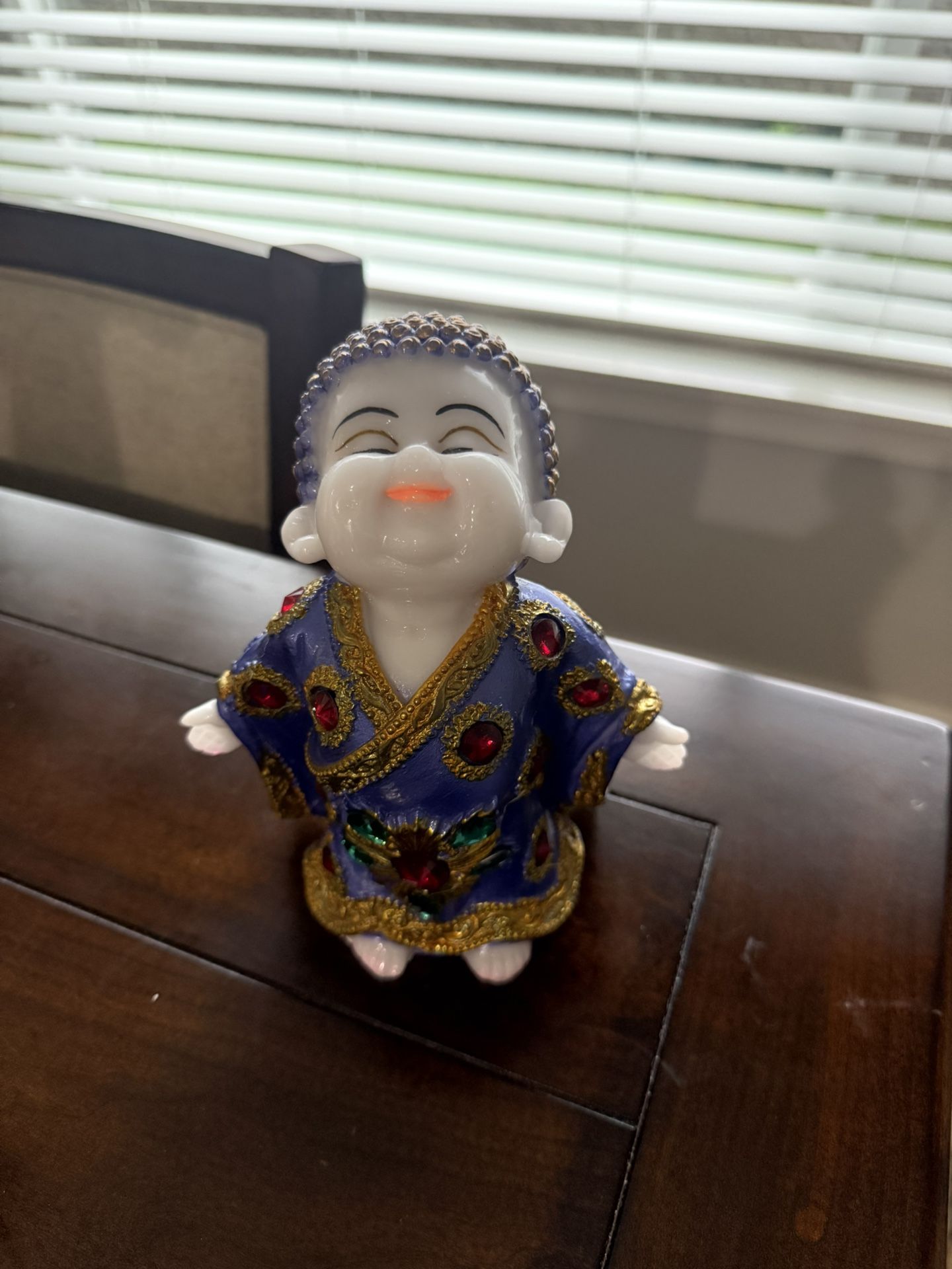 Laughing Buddha Figurine – $5