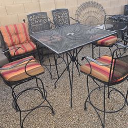 $350  IRON SWIVEL 4 BARSTOOLS AND TABLE 