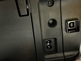 Black Electronic Device with USB-B and Power Port