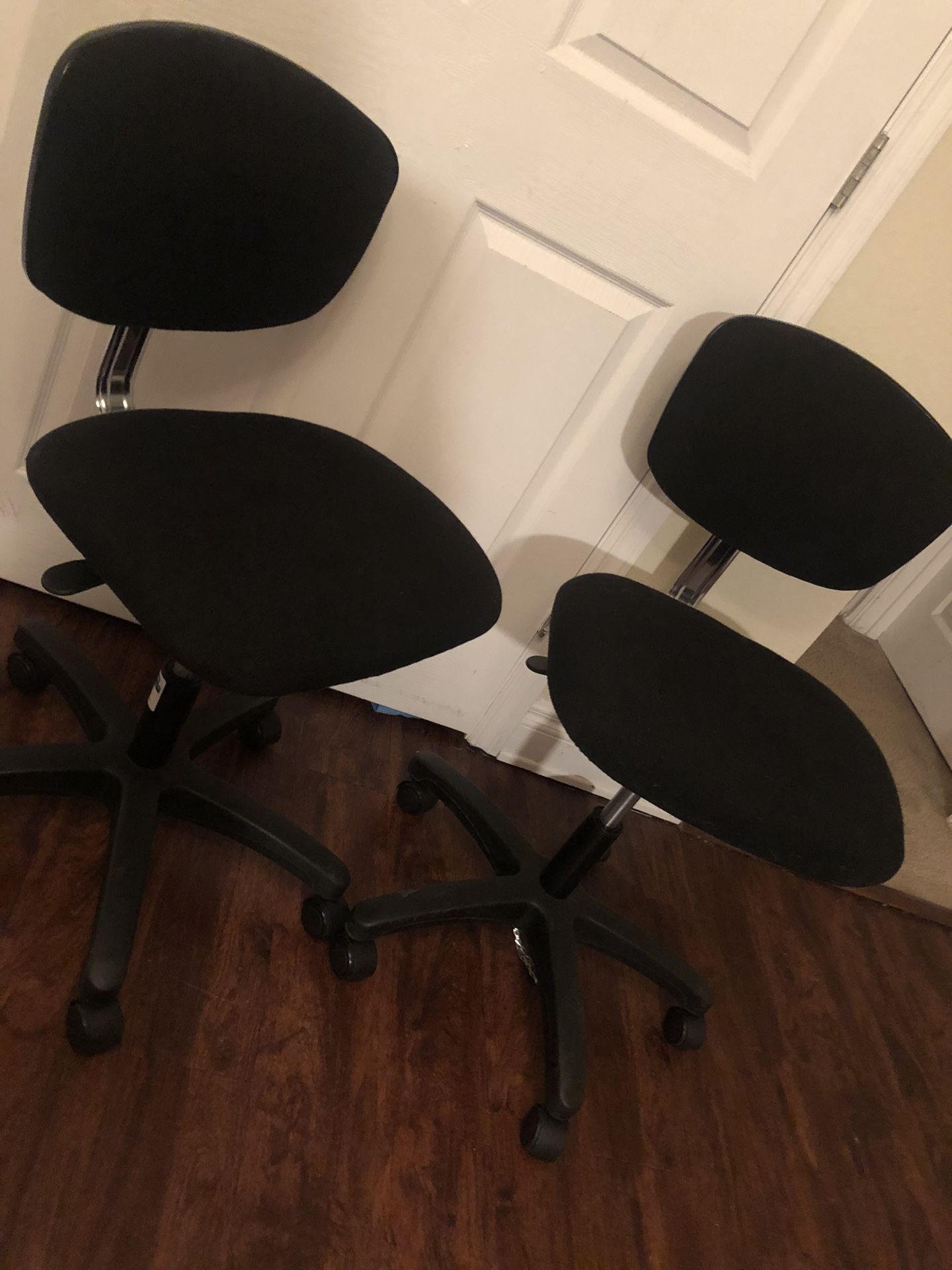 Two Black Rolling Chairs