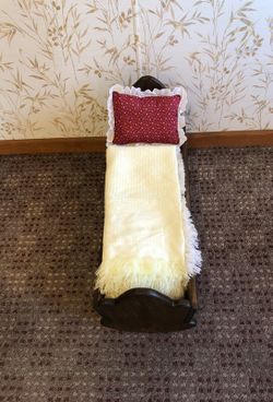 Doll cradle with pillow and blanket