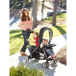 Graco double  stroller sit and stand with rain cover