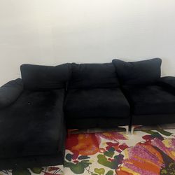 L-shape black sectional couch 