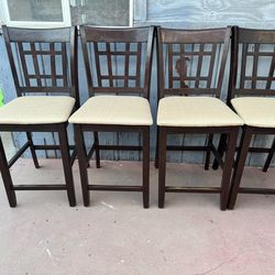 Four chairs solid wood in good condition all chairs have new upholstery on it
