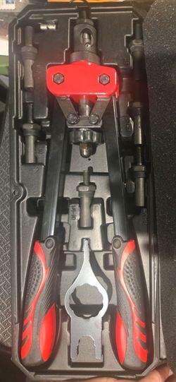 red and black Wetols 14" Rivet Nut Tool (WE-882), which features dual carbon-steel arms with ergonomic rubber grips and multiple interchangeable metri