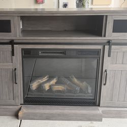 Gray entertainment Fireplace with built in speaker