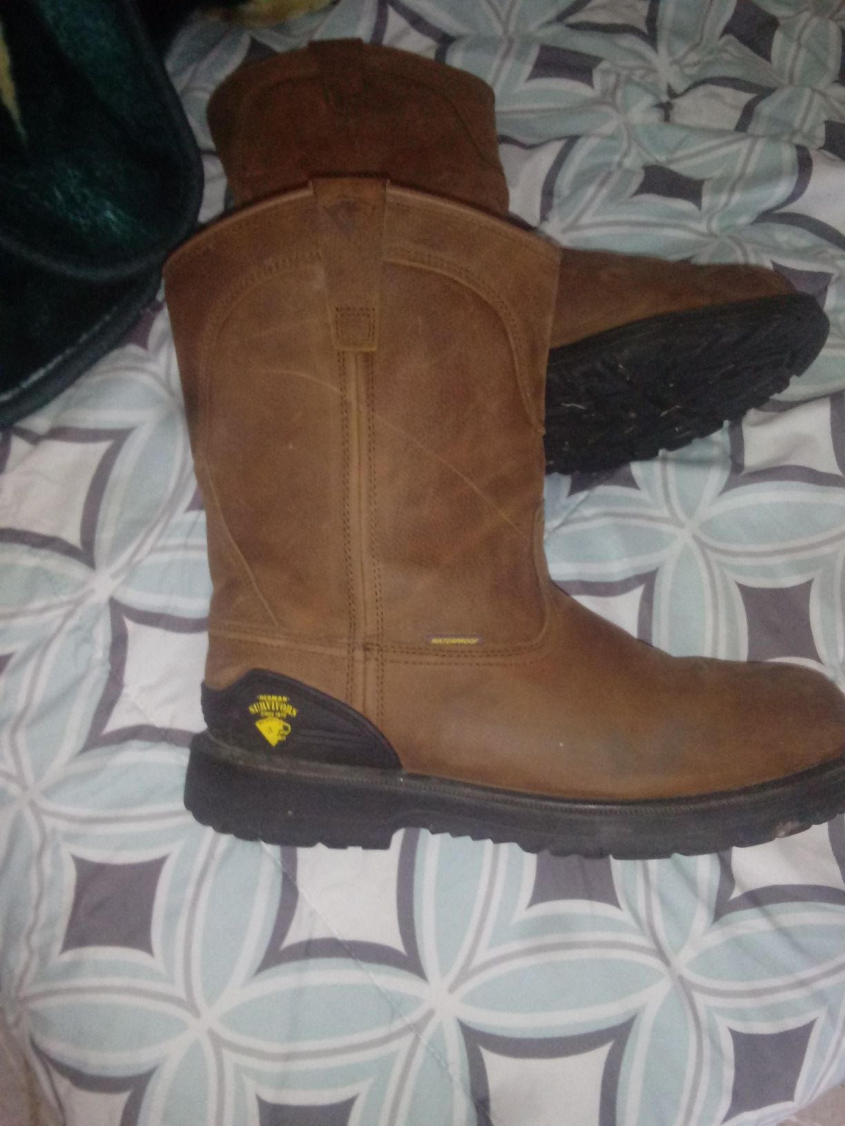 Size 13 slip resistant steel toe boots brand new only wore for 5 min.