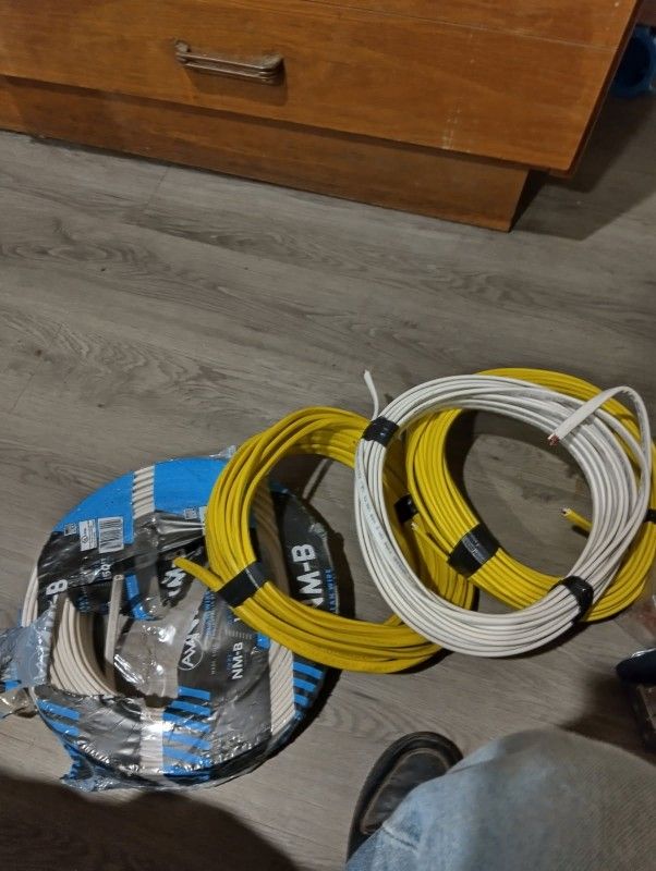50 Ft Of 12/3 Romex Electrical Wire And 50 Ft Of 14/3 Romex Electrical wire And 10 Ft Of 8/2 With Ground$75 OBO 
