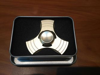 Metal spinner with case