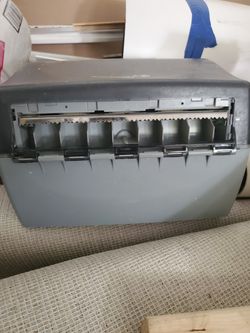 Hands free towel dispenser