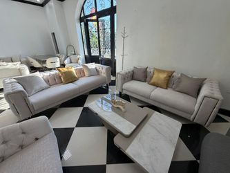 Sofa and loveseat.  $53 downpayment