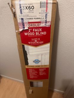Faux wood blind