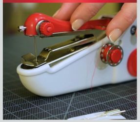 Handheld electric sewing machine