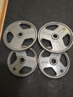 Used 35lb And 45lb Grip Plates Olympic Weight Plates--