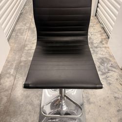 Set of 2 Crosby St. Maxwell Adjustable Faux Leather Barstool, Black. One like New and One Brand New