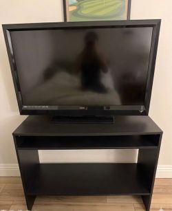 Vizio TV with Night stand