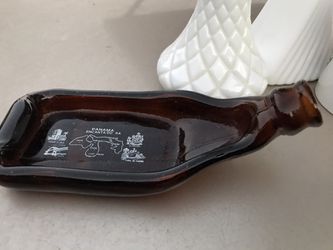 Vintage melted glass bottle