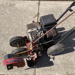 Edger, Gas, 4 Stroke used for sidewalks