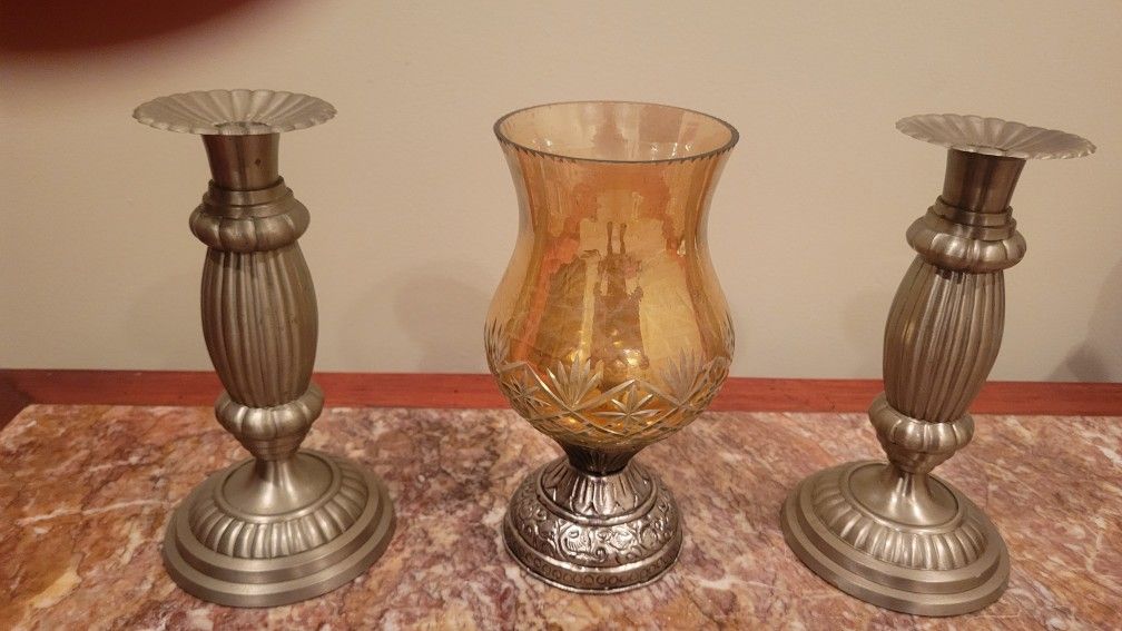 Two Candle Holders and One Glass Candle holder