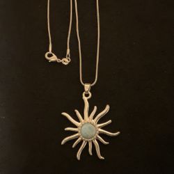 16” SilverTone Necklace With SilverTone Sun Pendant With Aquamarinestone