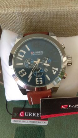 Brand New Curren brown leather band.