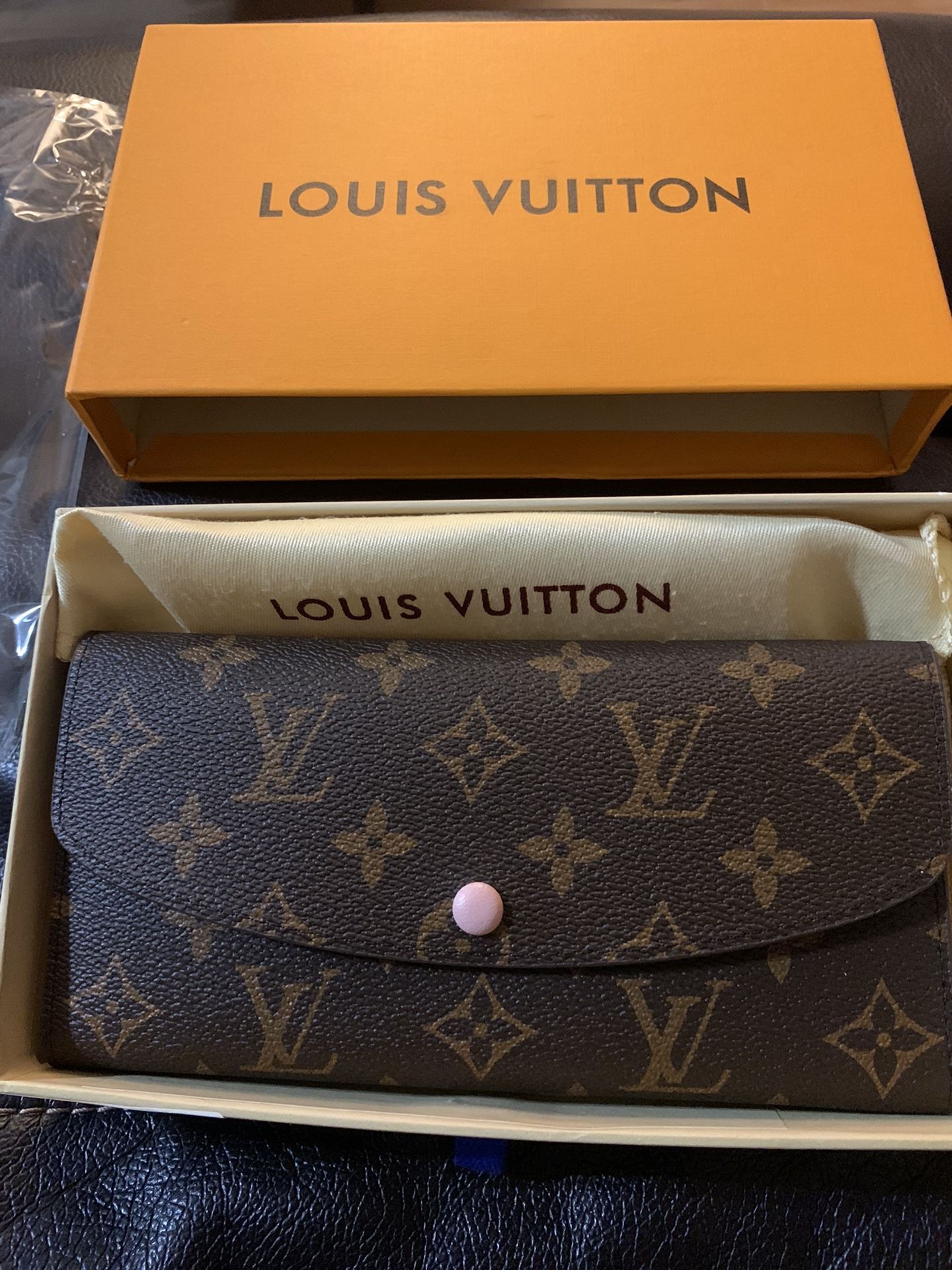 woman's designer pink wallet 