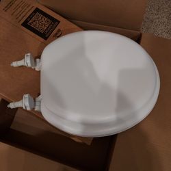 Cushioned toilet seat