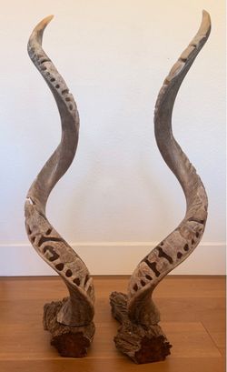 PAIR OF AUTHENTIC SOUTH AFRICAN CARVED HORN SCULPTURES