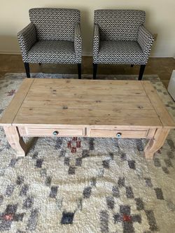 2 arm chairs, evil eyes coffee table and carpet