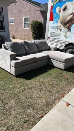 New Grey Living Spaces Sofa
