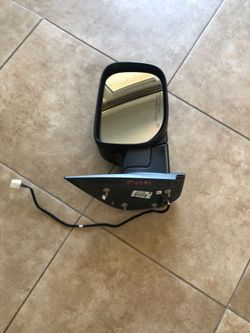 Titan motorized passenger mirror