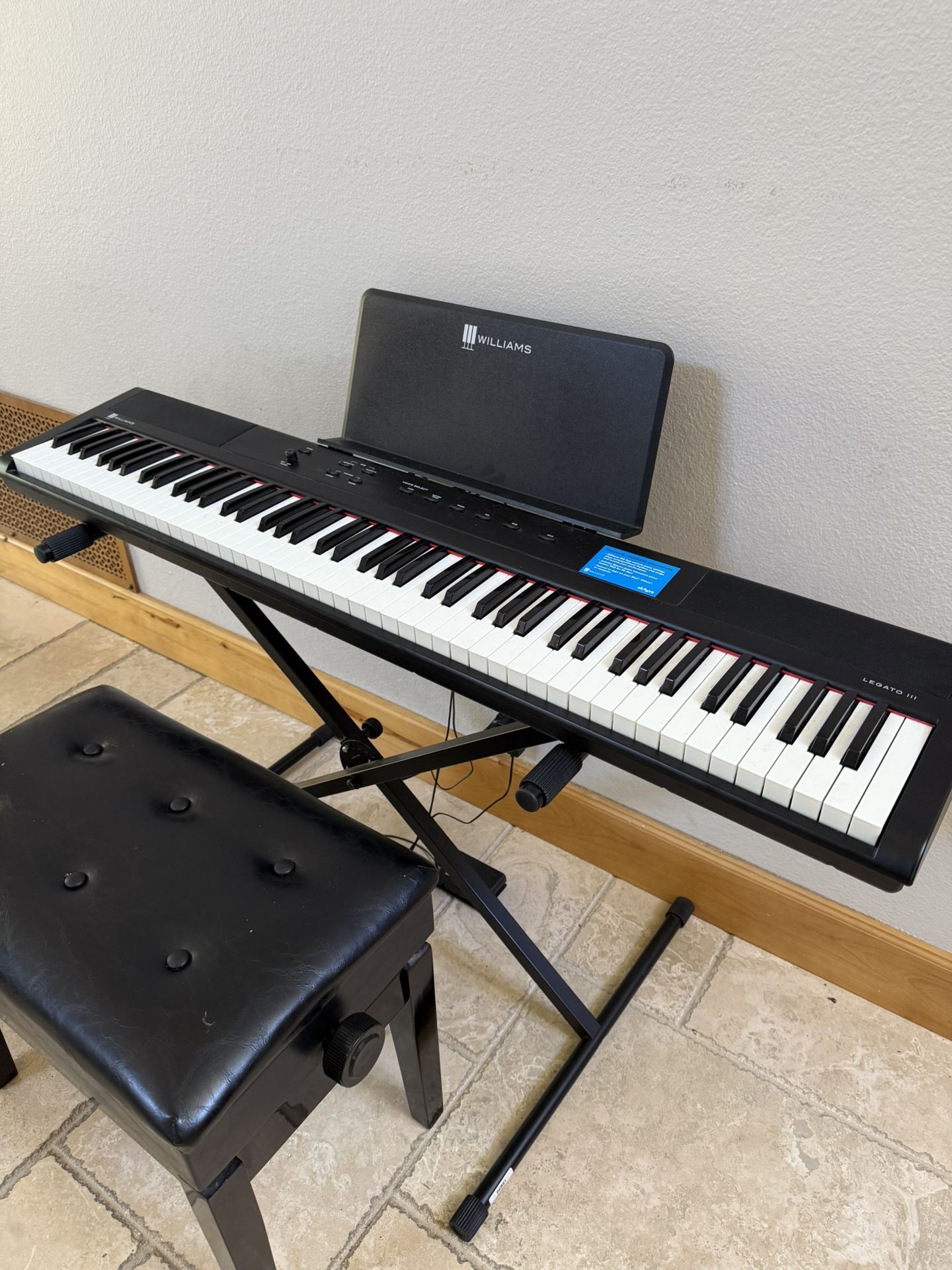 Williams Legato III digital piano with stand and bench.