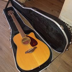 Yamaha guitar with hard shell case