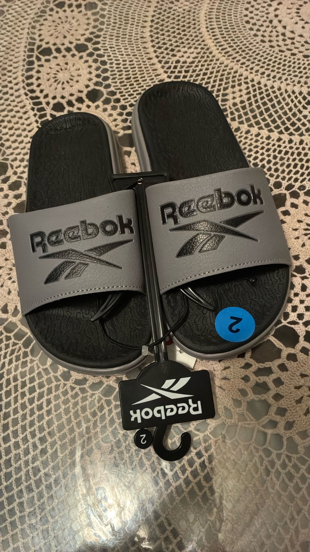 Child’s Reeboks Slip Ons